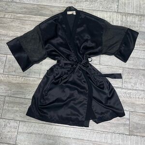 Vintage Victoria’s Secret gold label 1990s black silky robe with sheer sleeves.
